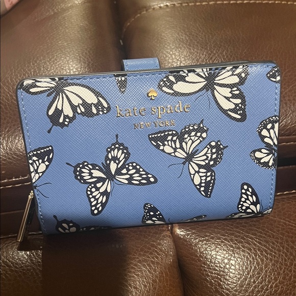 kate spade Handbags - Kate Spade Blue and Black Butterfly Wallet